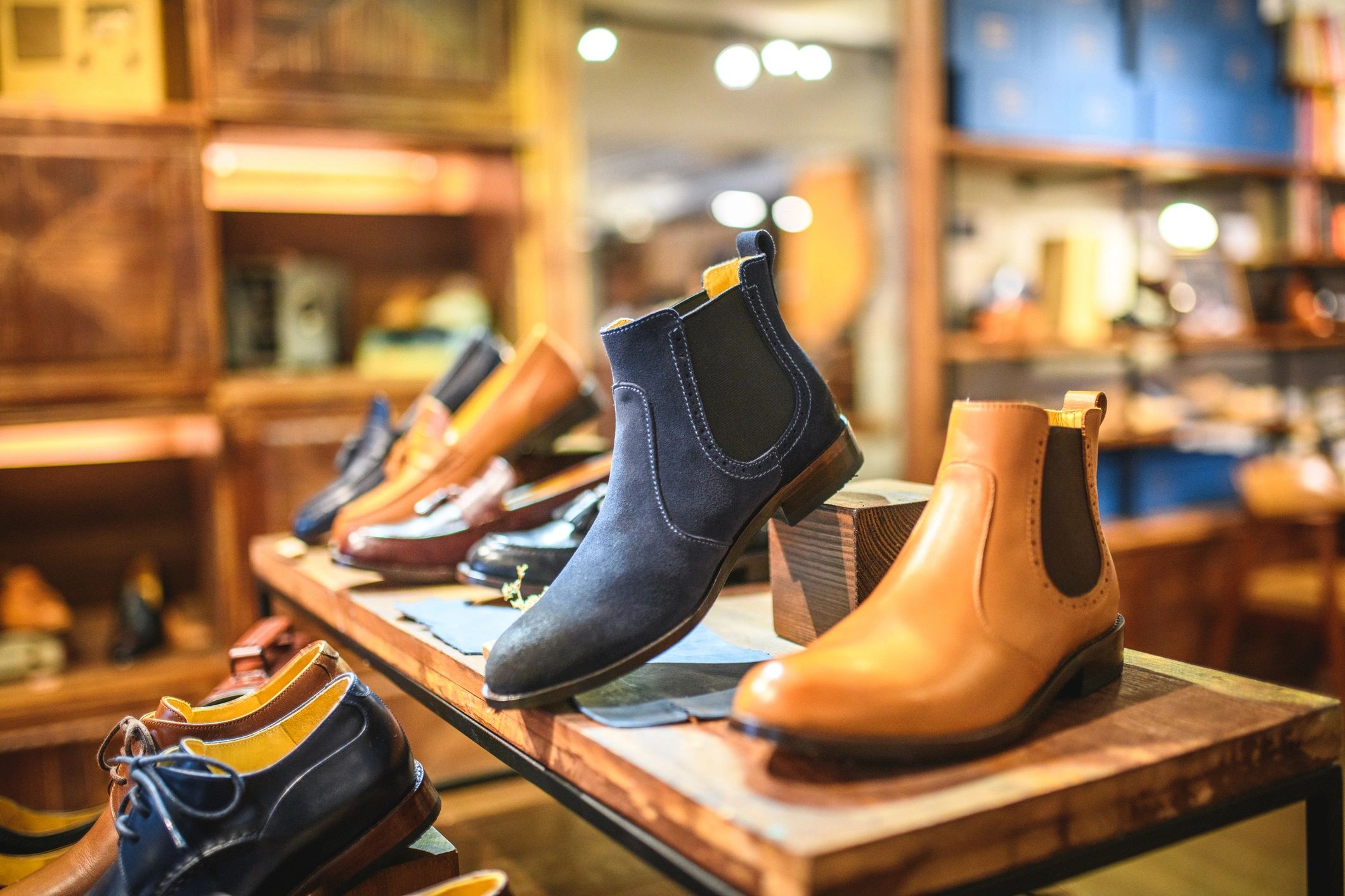 Curated leather shoes on a retail shelf