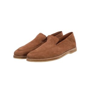 Tan suede Chelsea boot on a white background.